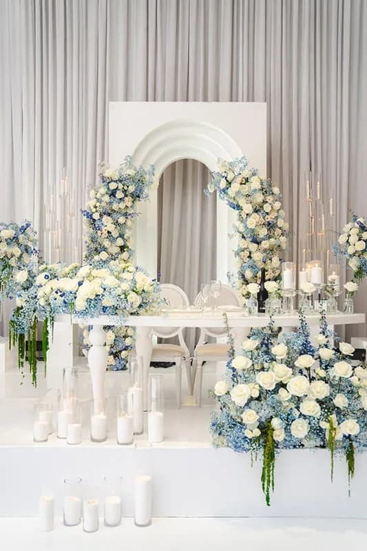 Blue and white wedding arch floral arrangement by Bana Florist Toronto