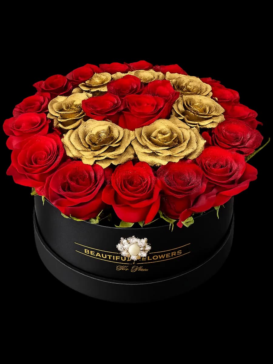 30 red and gold roses in a black satin round box from Bana Florist