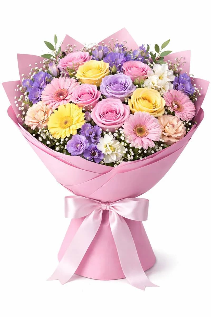 Spring mix bouquet with pink wrapping and ribbon by Bana Florist Toronto